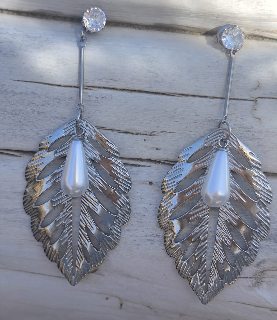 PENDIENTES PLUMA